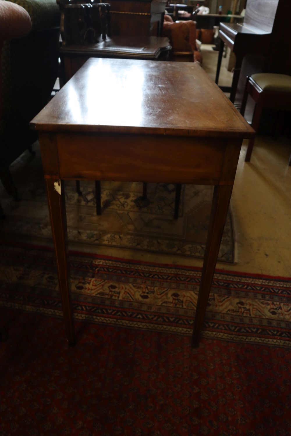 A George III later banded mahogany side table, width 85cm, depth 44cm, height 76cm